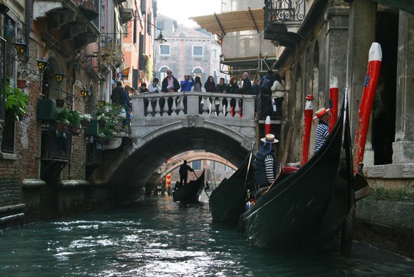 Live life to the fullest: take a gondola ride in Venice.