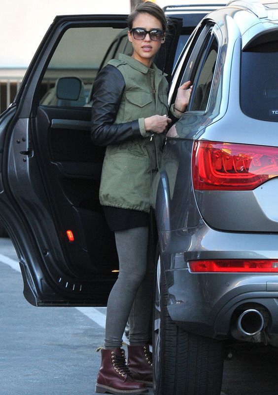 Jessica Alba wearing military jacket and dr martens