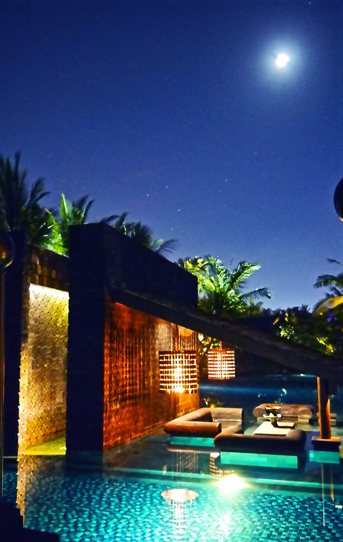 St Regis pool at night time in Bali